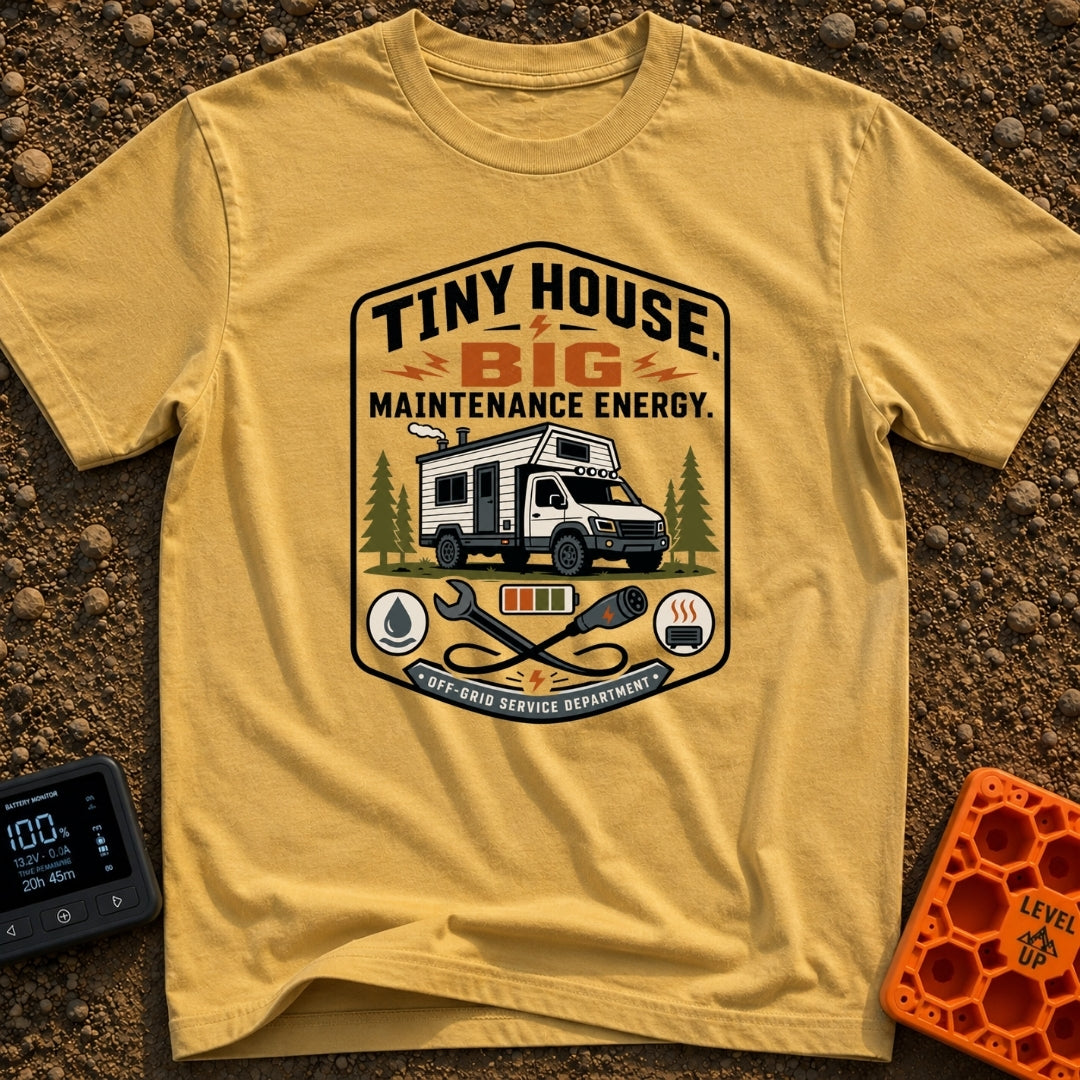 Big Maintenance Energy - T-Shirt in Mustard - A badge-style design showing an off-road truck camper parked among pine...