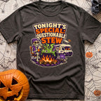 Tonights Questionable Stew - T-Shirt in Graphite - A cartoon skeleton wearing a beanie and vest sits in a camp chair...