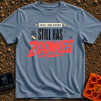 Still Has Zoomies - T-Shirt in Blue Jean - A typography-based design reading "TRAIL DOG STATUS: STILL HAS ZOOMIES" with...