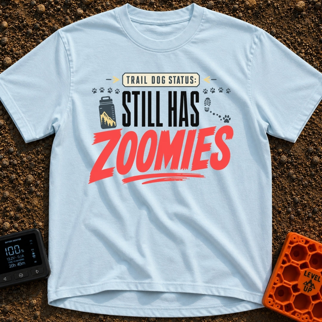 Still Has Zoomies - T-Shirt in Chambray - A typography-based design reading "TRAIL DOG STATUS: STILL HAS ZOOMIES" with...