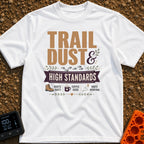 Dust And High Standards - T-Shirt in White - Typographic design reading "TRAIL DUST & HIGH STANDARDS" over a banner,...