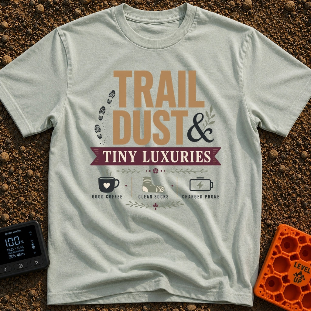 Dust And Tiny Luxuries - T-Shirt in Bay - The design displays the typographic text "TRAIL DUST & TINY LUXURIES" alongside...