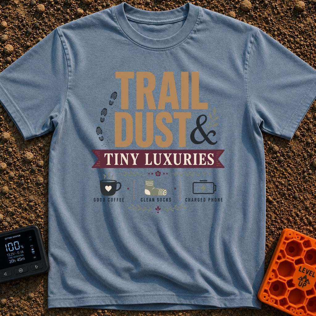 Dust And Tiny Luxuries - T-Shirt in Blue Jean - The design displays the typographic text "TRAIL DUST & TINY LUXURIES"...
