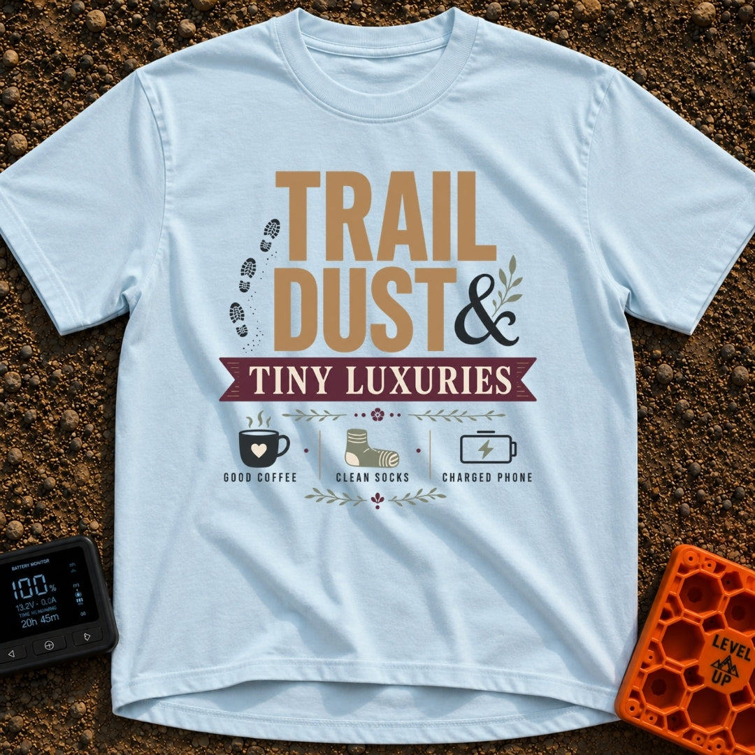 Dust And Tiny Luxuries - T-Shirt in Chambray - The design displays the typographic text "TRAIL DUST & TINY LUXURIES"...