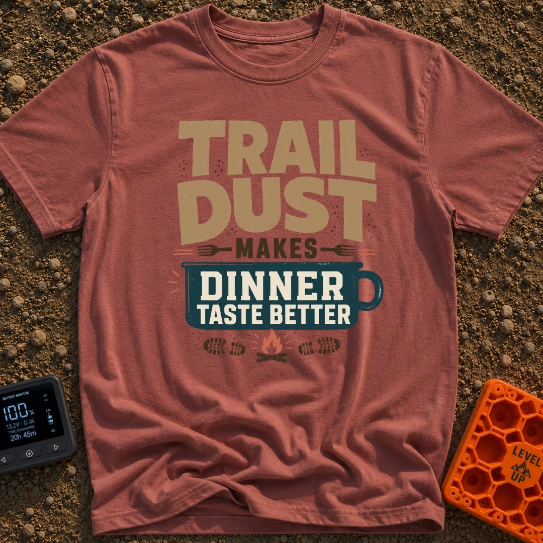Seasoned With Trail Dust - T-Shirt in Brick - A typographic design reading "TRAIL DUST MAKES DINNER TASTE BETTER" with...