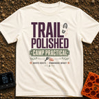 Polished Yet Practical - T-Shirt in Ivory - A typography-based design featuring the text "TRAIL POLISHED" and "CAMP...
