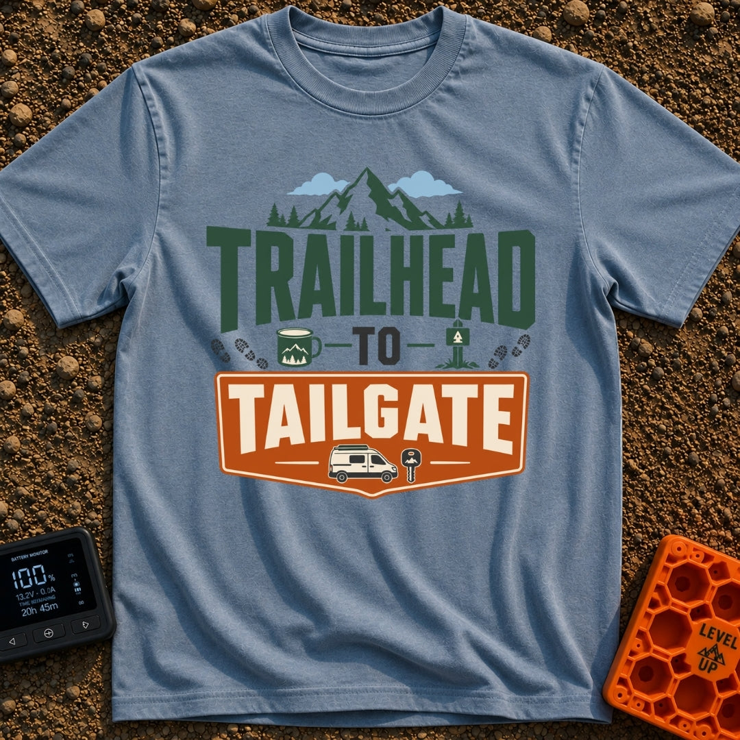 Peaks To Pints - T-Shirt in Blue Jean - The typographic design reads "TRAILHEAD TO TAILGATE" surrounded by various...