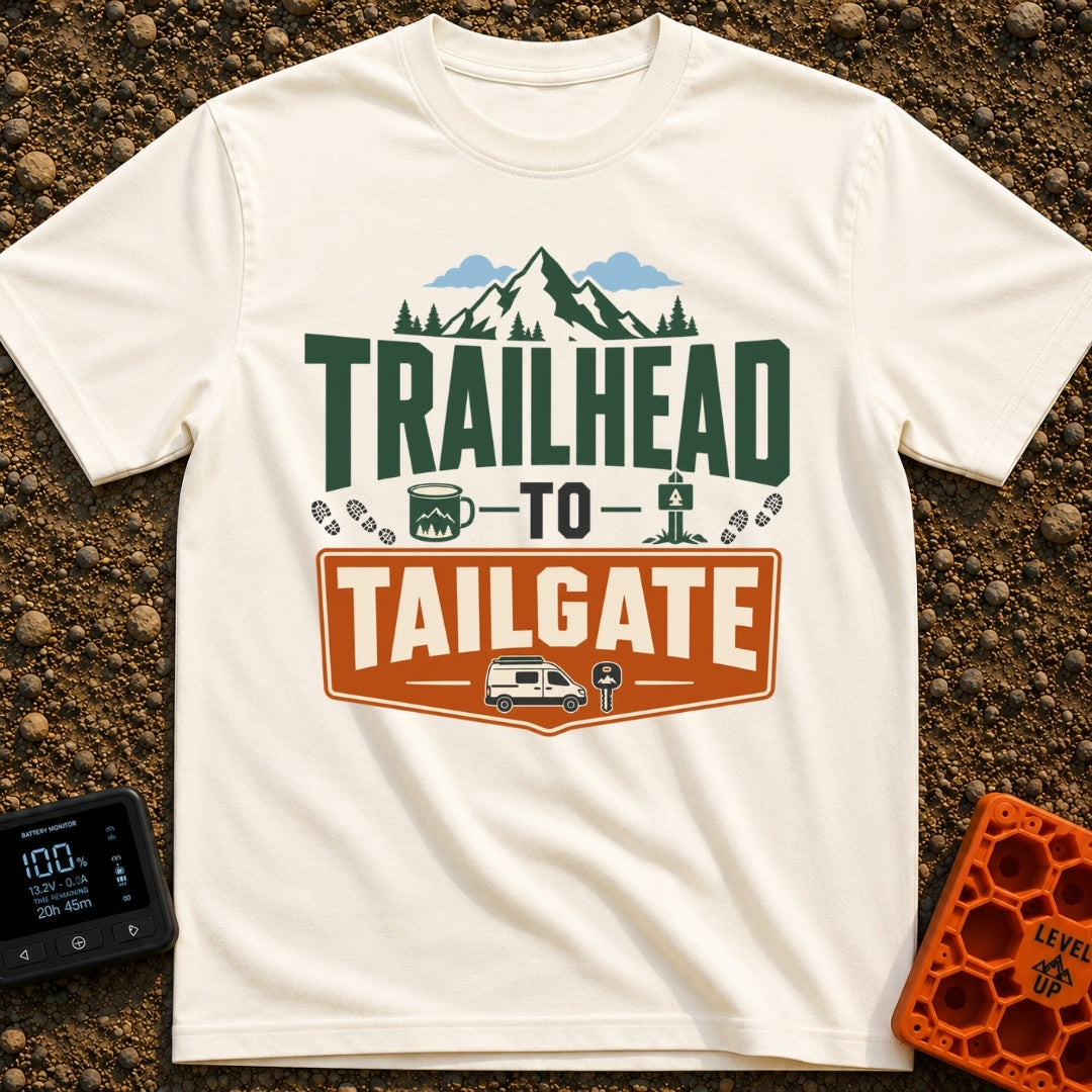 Peaks To Pints - T-Shirt in Ivory - The typographic design reads "TRAILHEAD TO TAILGATE" surrounded by various outdoor...