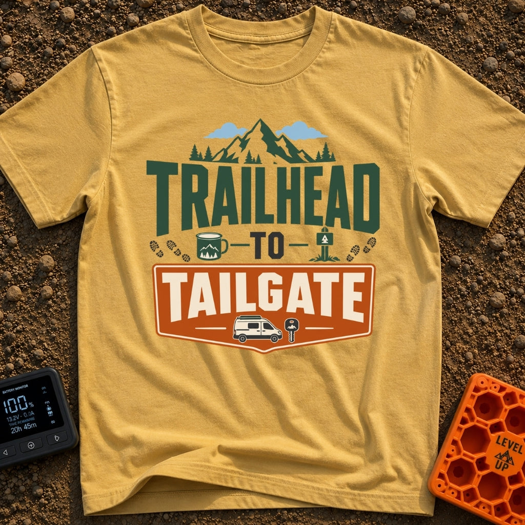 Peaks To Pints - T-Shirt in Mustard - The typographic design reads "TRAILHEAD TO TAILGATE" surrounded by various outdoor...