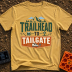 Peaks To Pints - T-Shirt in Mustard - The typographic design reads "TRAILHEAD TO TAILGATE" surrounded by various outdoor...