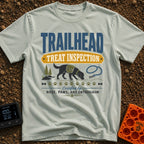 Will Hike For Treats - T-Shirt in Bay - A graphic design featuring the text "TRAILHEAD TREAT INSPECTION" above a...