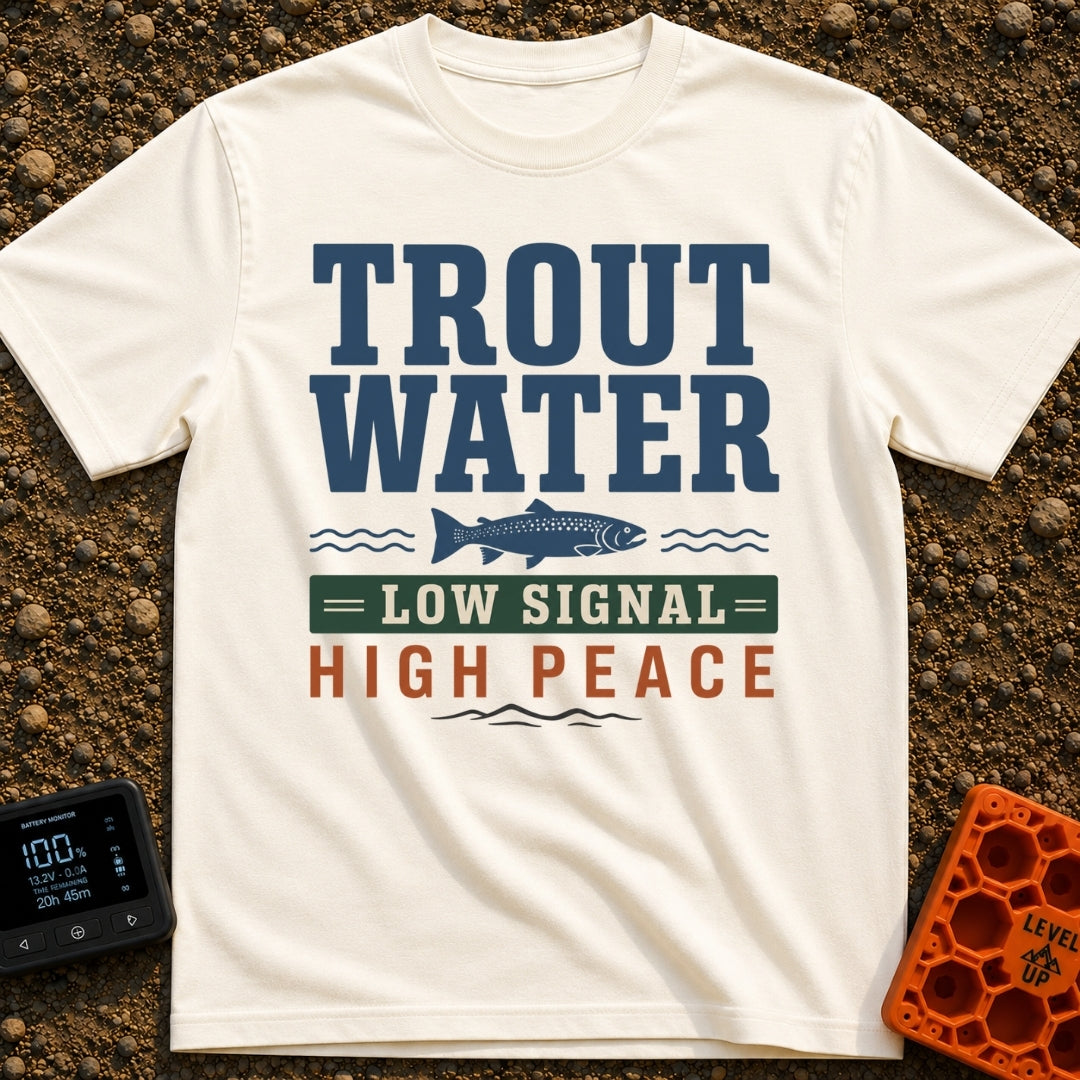 Trout Tranquility Zone - T-Shirt in Ivory - A typographic design featuring the text "TROUT WATER" in large blue letters...