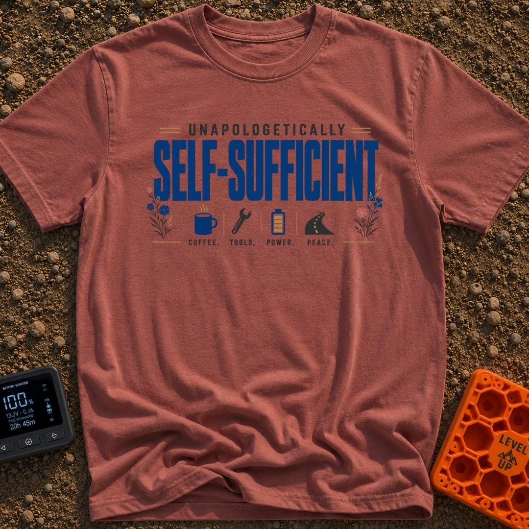 Unplugged And Unbothered - T-Shirt in Brick - The design features the text "UNAPOLOGETICALLY SELF-SUFFICIENT" prominently...