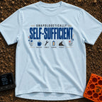 Unplugged And Unbothered - T-Shirt in Chambray - The design features the text "UNAPOLOGETICALLY SELF-SUFFICIENT"...