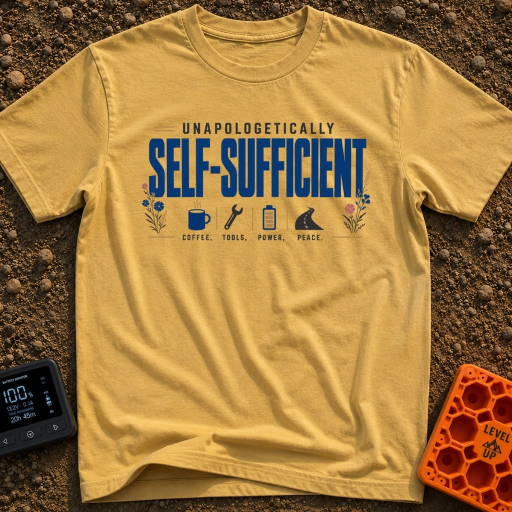Unplugged And Unbothered - T-Shirt in Mustard - The design features the text "UNAPOLOGETICALLY SELF-SUFFICIENT"...