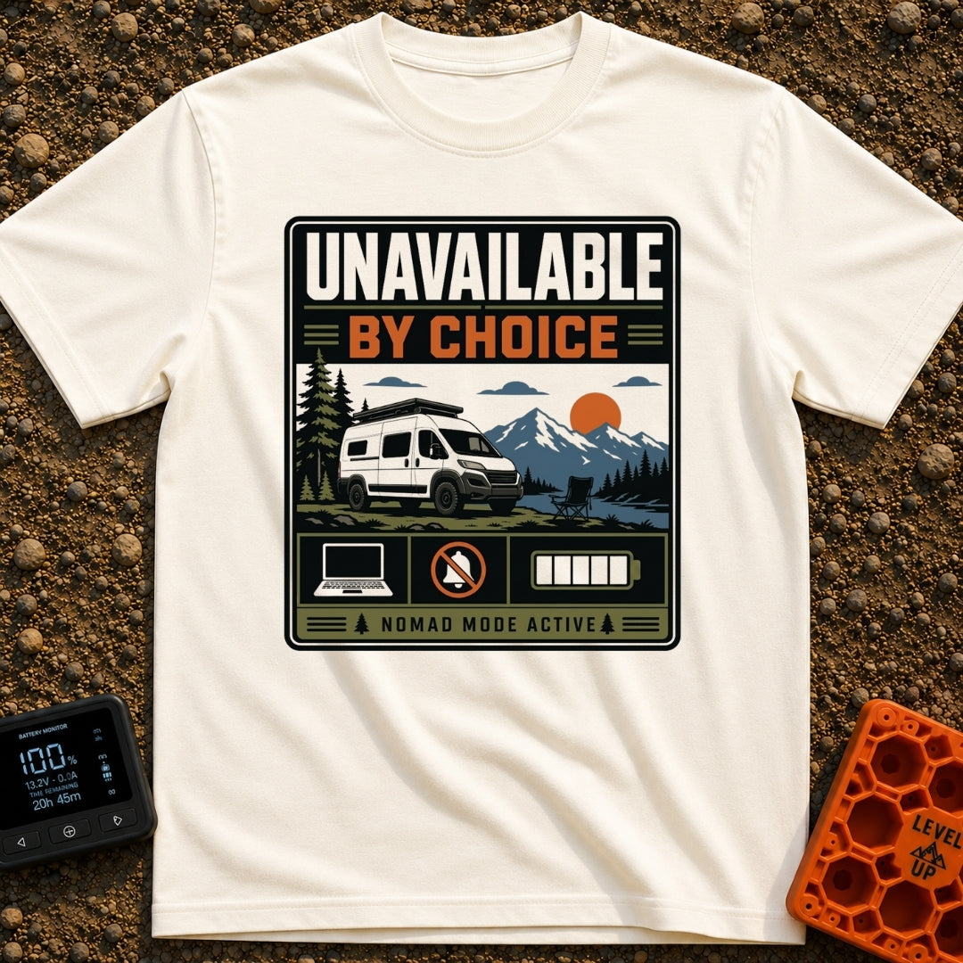 Offline By Design - T-Shirt in Ivory - A graphic featuring a white camper van parked by a lake with an empty camp chair,...