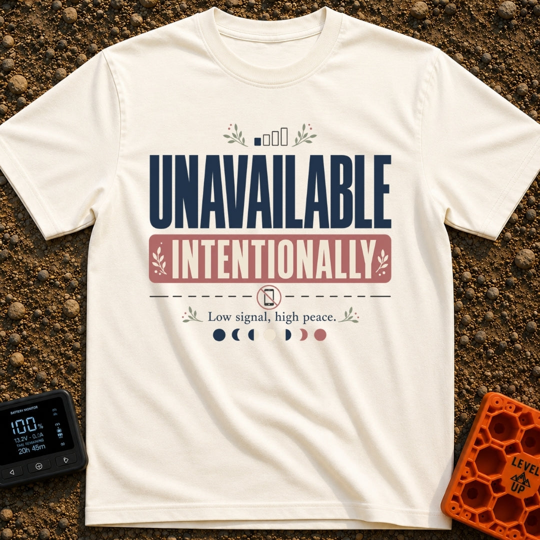 Off Grid On Purpose - T-Shirt in Ivory - Typographic design reading "UNAVAILABLE INTENTIONALLY" and "Low signal, high...