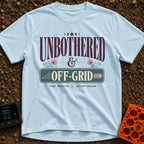 Zero Bars Zero Cares - T-Shirt in Chambray - A typographic design reading "UNBOTHERED & OFF-GRID" alongside the phrases...