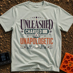 Charged And Unleashed - T-Shirt in Bay - A typographic design reading "UNLEASHED CHARGED & UNAPOLOGETIC" featuring moon...