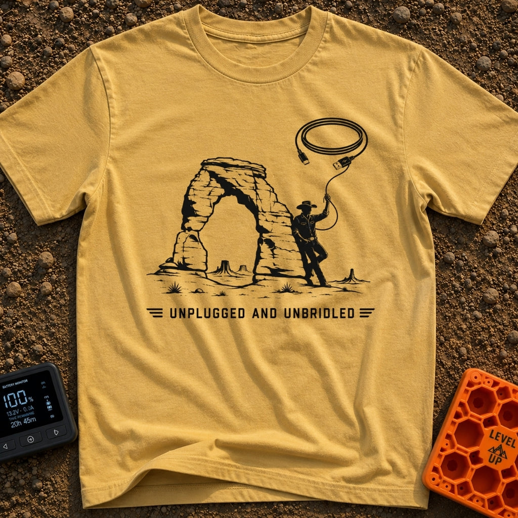 USB Rodeo Wrangler - T-Shirt in Mustard - A black and white illustration of a cowboy leaning against a large natural rock...