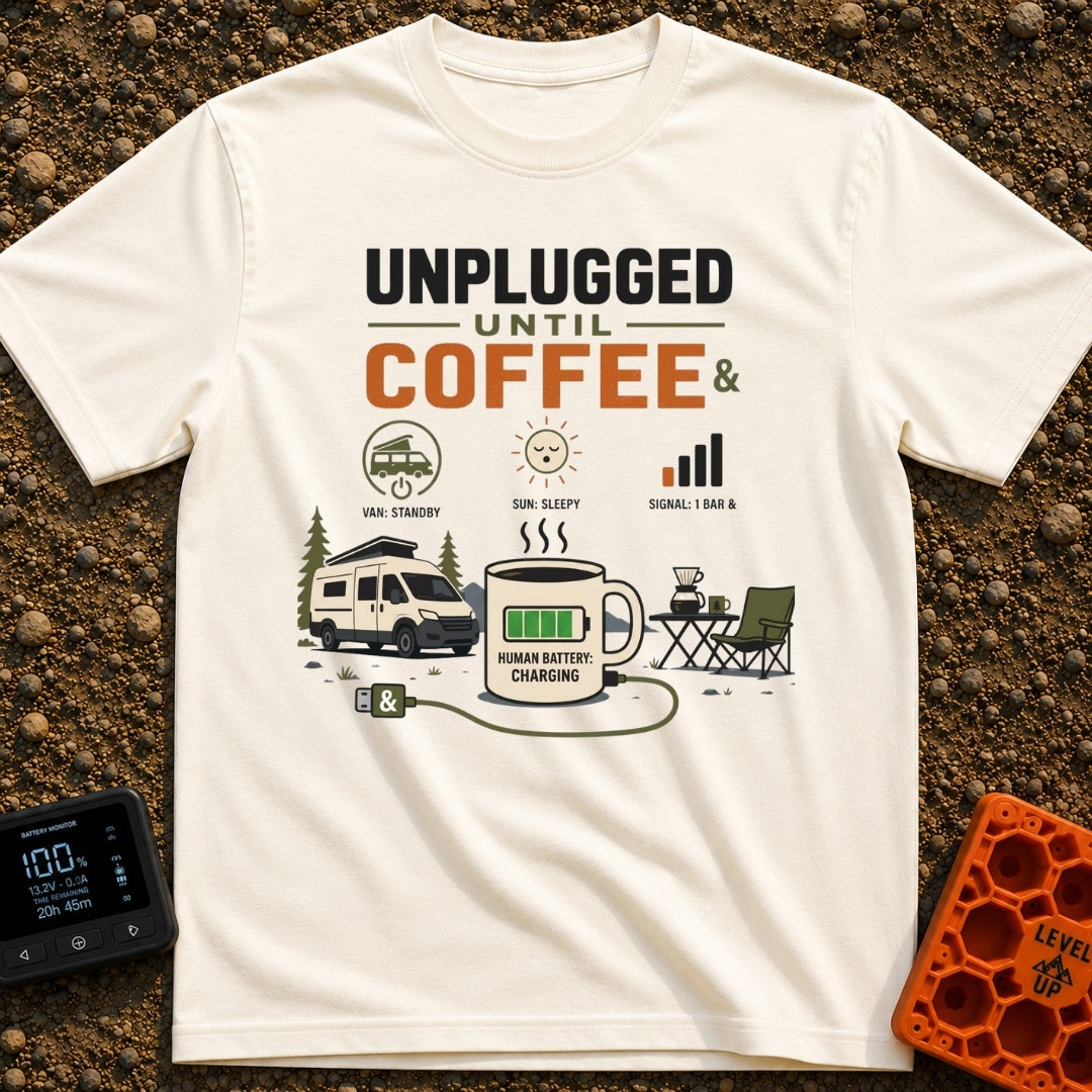 Unplugged Until Coffee - T-Shirt in Ivory - A graphic featuring a large coffee mug with a green charging battery symbol,...