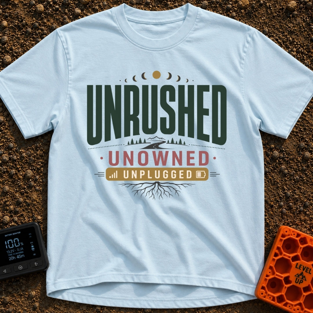 Unplugged And Unbothered - T-Shirt in Chambray - A typographic design featuring the words "UNRUSHED UNOWNED UNPLUGGED"...
