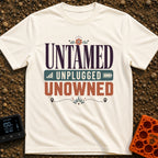 Untamed And Unplugged - T-Shirt in Ivory - A typographic design featuring the words "UNTAMED," "UNPLUGGED," and "UNOWNED"...
