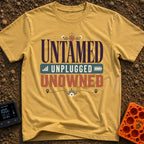 Untamed And Unplugged - T-Shirt in Mustard - A typographic design featuring the words "UNTAMED," "UNPLUGGED," and...