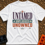 Untamed And Unplugged - T-Shirt in White - A typographic design featuring the words "UNTAMED," "UNPLUGGED," and "UNOWNED"...