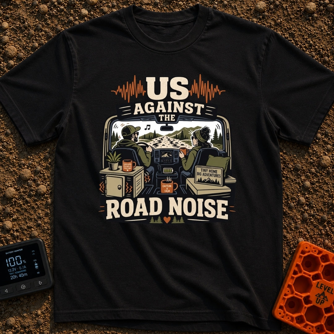 Us Against Road Noise - T-Shirt in Black - An illustration from the interior perspective of a van driving down a bumpy...