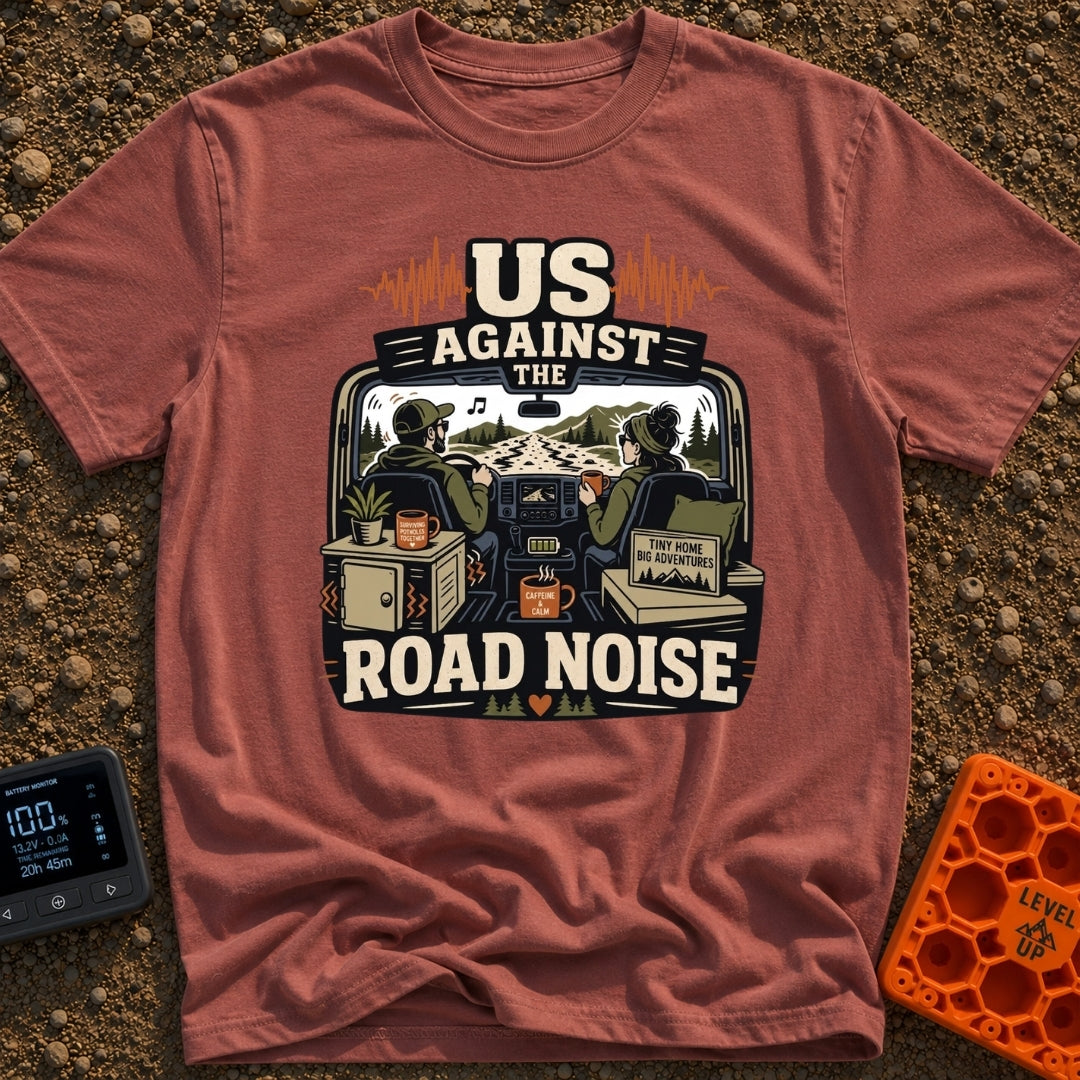 Us Against Road Noise - T-Shirt in Brick - An illustration from the interior perspective of a van driving down a bumpy...