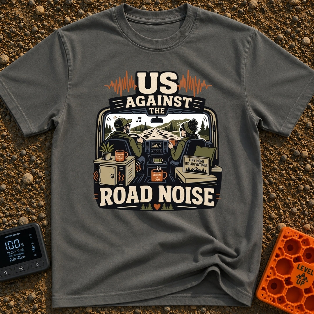 Us Against Road Noise - T-Shirt in Pepper - An illustration from the interior perspective of a van driving down a bumpy...