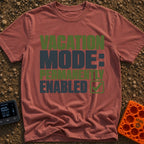 Permanent Vacation Mode - T-Shirt in Brick - Large, bold block text reading "VACATION MODE: PERMANENTLY ENABLED" stacked...