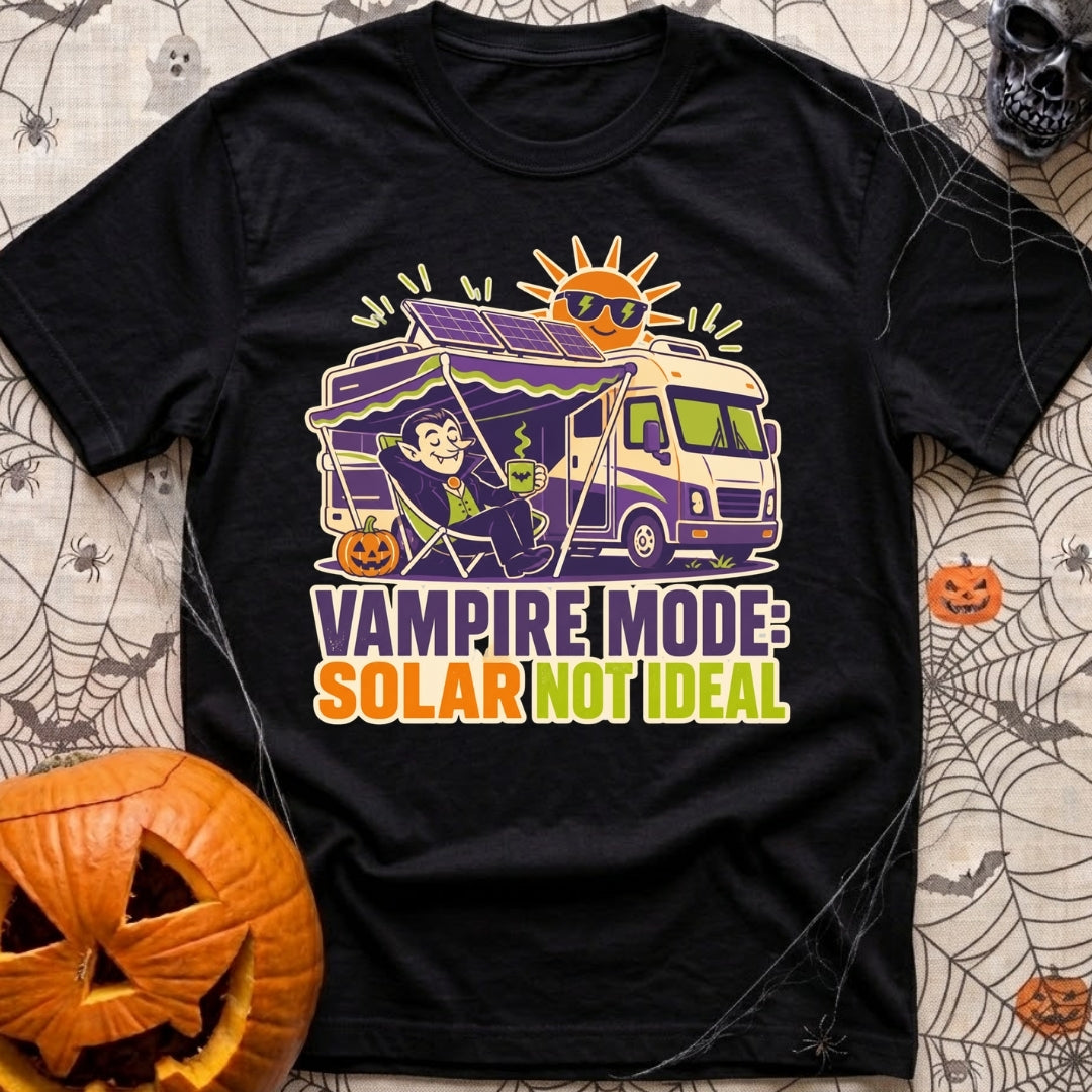 Solar Sucks For Vampires - T-Shirt in Black - A cartoon illustration of a vampire relaxing in a camp chair holding a...