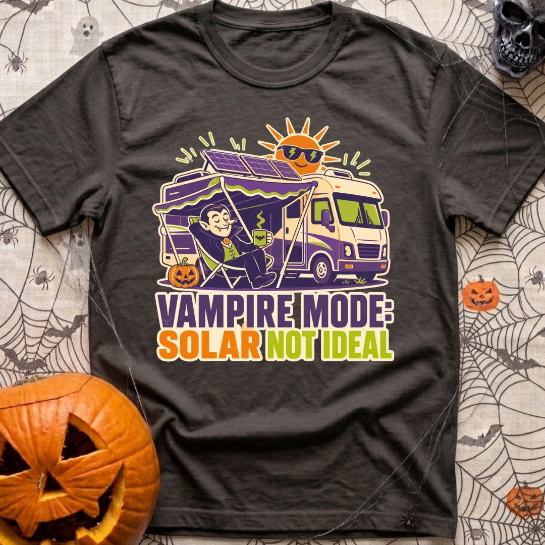 Solar Sucks For Vampires - T-Shirt in Graphite - A cartoon illustration of a vampire relaxing in a camp chair holding a...