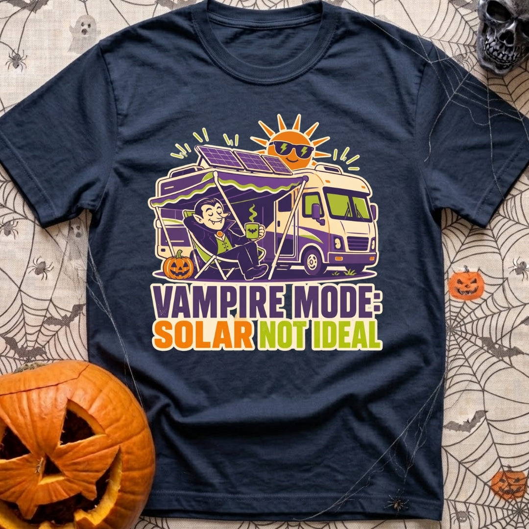 Solar Sucks For Vampires - T-Shirt in Navy - A cartoon illustration of a vampire relaxing in a camp chair holding a...