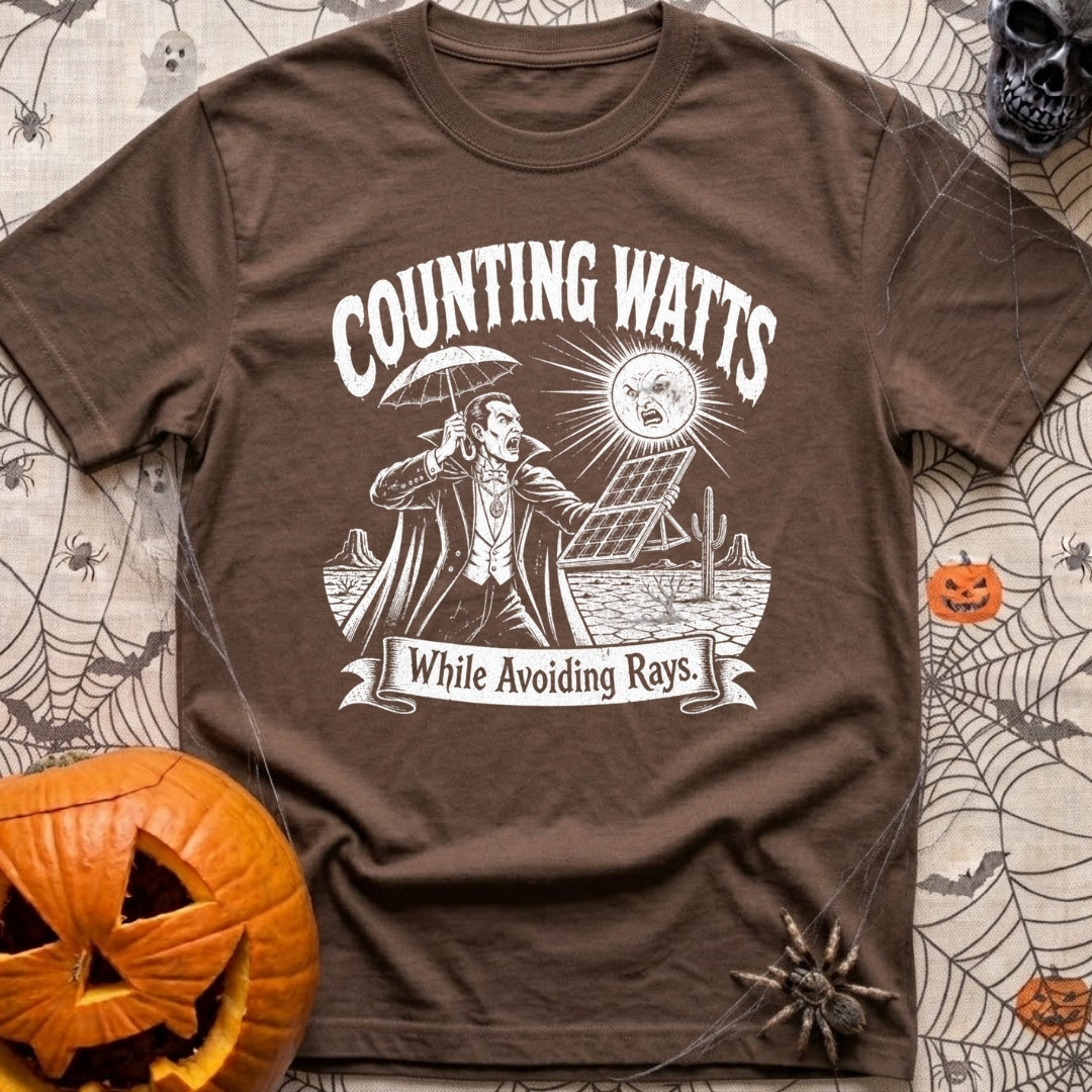 The Vampires Dilemma - T-Shirt in Espresso - A line drawing of a vampire standing in a desert landscape, holding a...