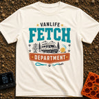 Chief Fetch Officer - T-Shirt in Ivory - A graphic featuring a camper van parked near mountains and pine trees, flanked...