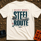 Velvet Ride Steel Route - T-Shirt in Ivory - A graphic design featuring an RV driving on a road through a desert...