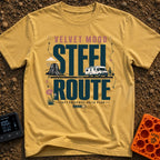 Velvet Ride Steel Route - T-Shirt in Mustard - A graphic design featuring an RV driving on a road through a desert...