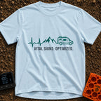 Heartbeats and Highways - T-Shirt in Chambray - A continuous teal line graphic that starts as an EKG heartbeat monitor,...