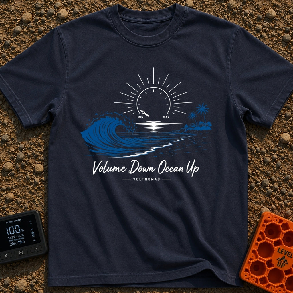 Wave Volume Control - T-Shirt in Navy - A graphic illustration featuring a large blue ocean wave on the left and a sandy...