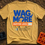 Wag More Buffer Less - T-Shirt in Mustard - A typographic design reading 'WAG MORE' in large blue letters with a dog's...