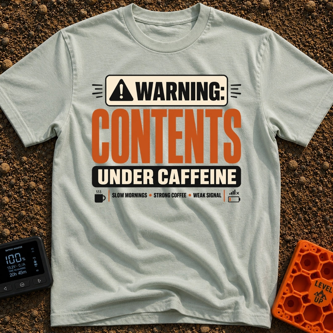 Contents Under Caffeine - T-Shirt in Bay - A typographic design styled like a hazard warning label that reads "WARNING:...