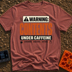 Contents Under Caffeine - T-Shirt in Brick - A typographic design styled like a hazard warning label that reads "WARNING:...