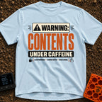 Contents Under Caffeine - T-Shirt in Chambray - A typographic design styled like a hazard warning label that reads...