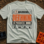 Warning Overthinking Ahead - T-Shirt in Bay - A warning label-style graphic with text reading "WARNING: OVERTHINKING IN...