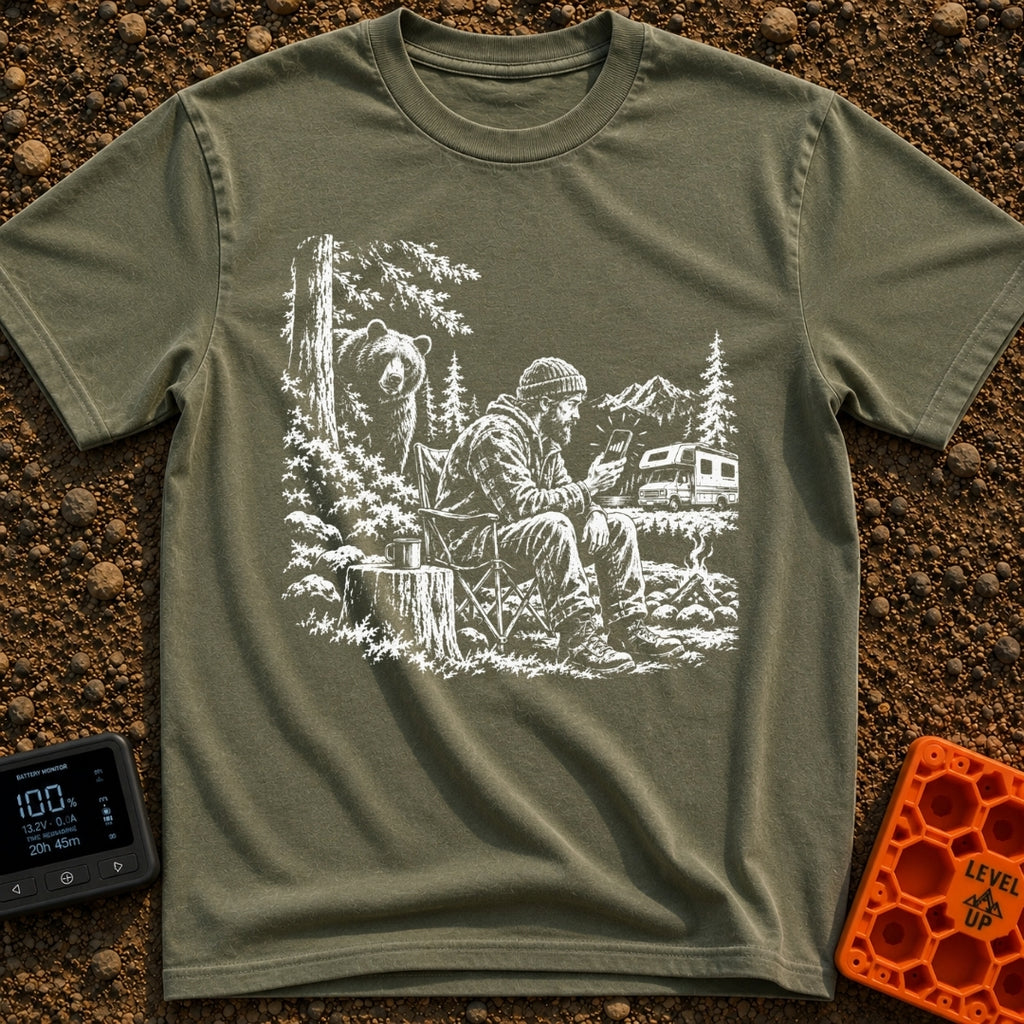 Meet The Locals - T-Shirt in Moss - A black and white illustration of a man sitting by a campfire looking at his...