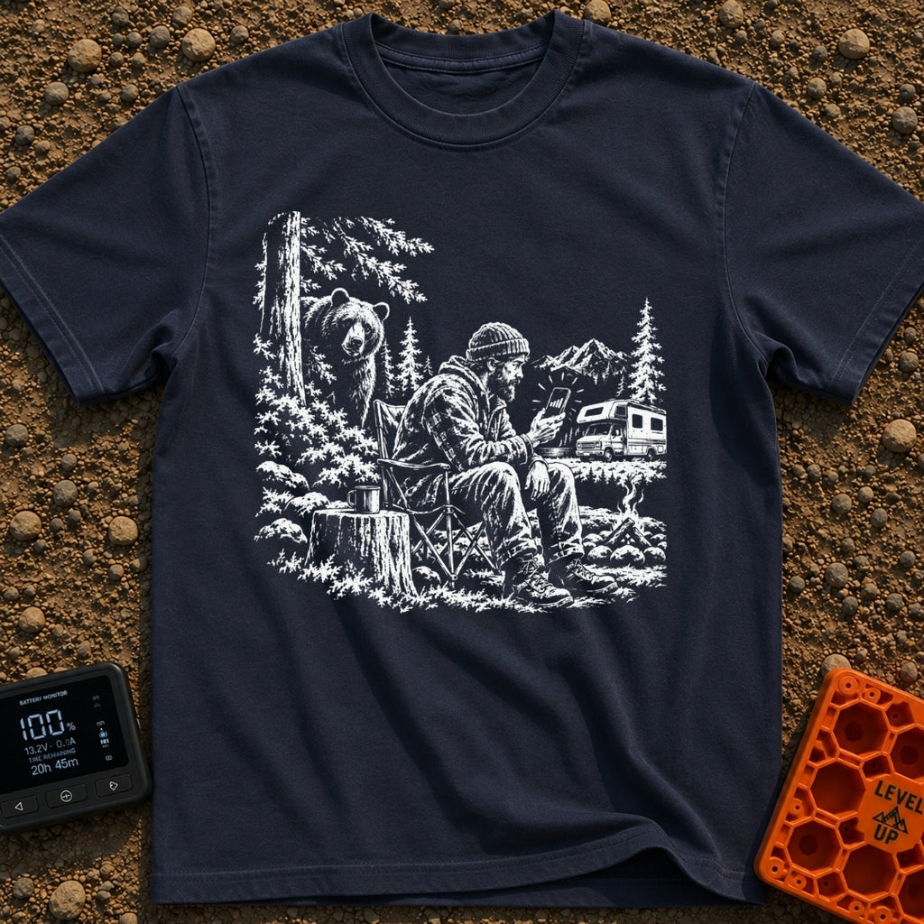 Meet The Locals - T-Shirt in Navy - A black and white illustration of a man sitting by a campfire looking at his...