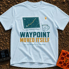 The Waypoint Lied - T-Shirt in Chambray - A graphic showing a digital tablet displaying a topographical map with a...